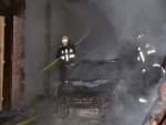Požár v areálu bývalého mlýna v obci Stvolínky na Českolipsku, kde oheň zničil auto s přívěsem