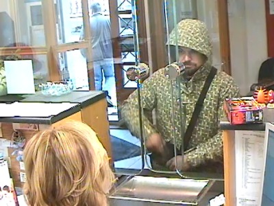 Harrachovskou pobočku České spořitelny přepadl ozbrojený zloděj