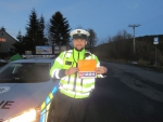 Dopravně preventivní akce, při které řidiči od policistů dostávali reflexní vesty pro své spolujezdce