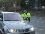 Dopravně preventivní akce, při které řidiči od policistů dostávali reflexní vesty pro své spolujezdce
