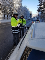 Dopravně preventivní akce, při které řidiči od policistů dostávali reflexní vesty pro své spolujezdce