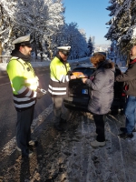 Dopravně preventivní akce, při které řidiči od policistů dostávali reflexní vesty pro své spolujezdce