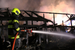 Požár dřevěného skladovacího objektu v Železném Brodě